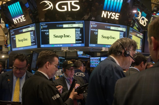 Les traders à Wall Street au cours de l’introduction en Bourse de Snap
