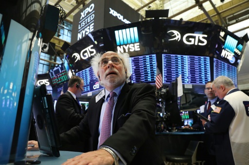 Traders sur le parquet du New York Stock Exchange le 11 octobre 2017