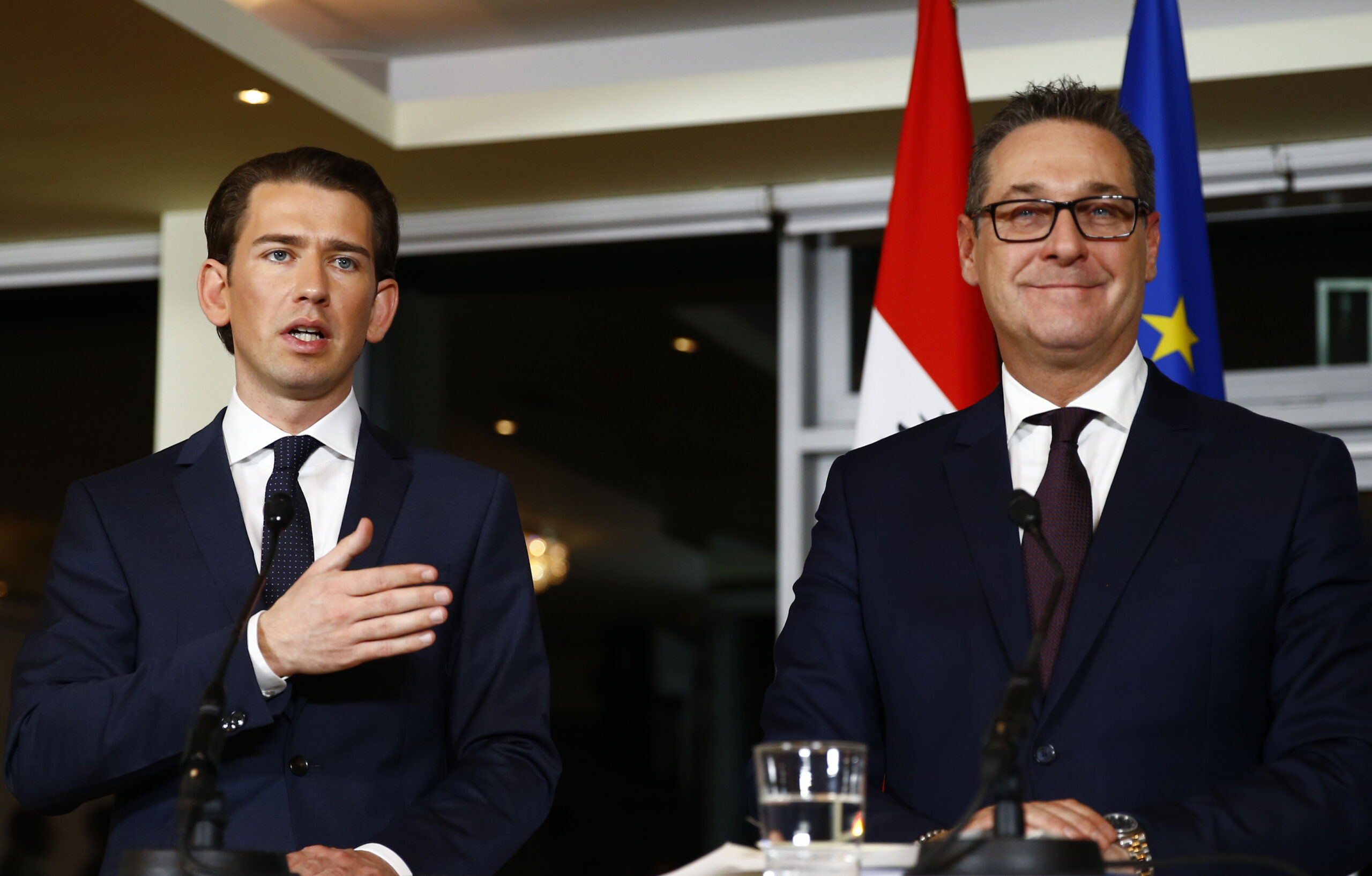 Head of the OeVP Kurz and head of the FPOe Strache address a news conference in Vienna